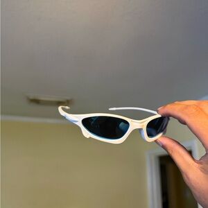 White Sporty Cat-Eye Sunglasses with Dark Lenses Oakley Oakleys